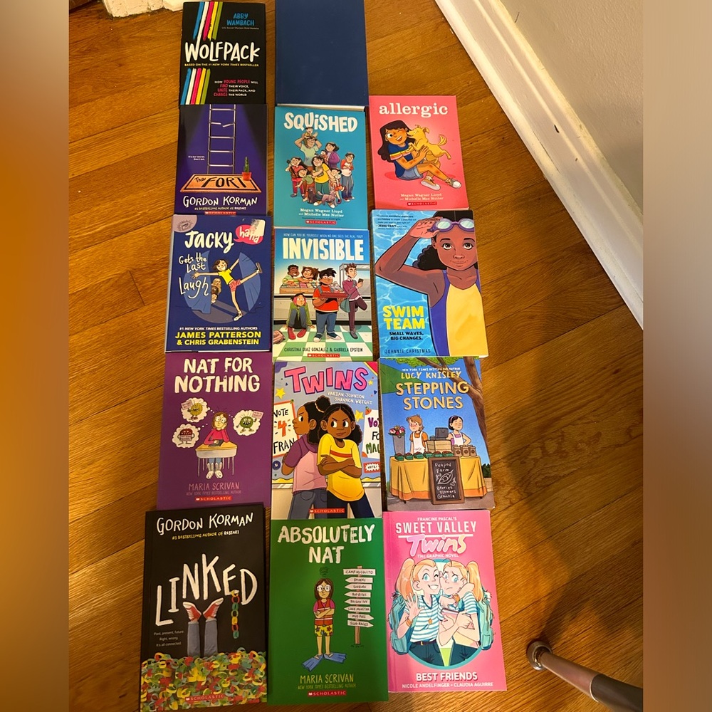 Lot of graphic novels and couple books. All almost perfect condition.